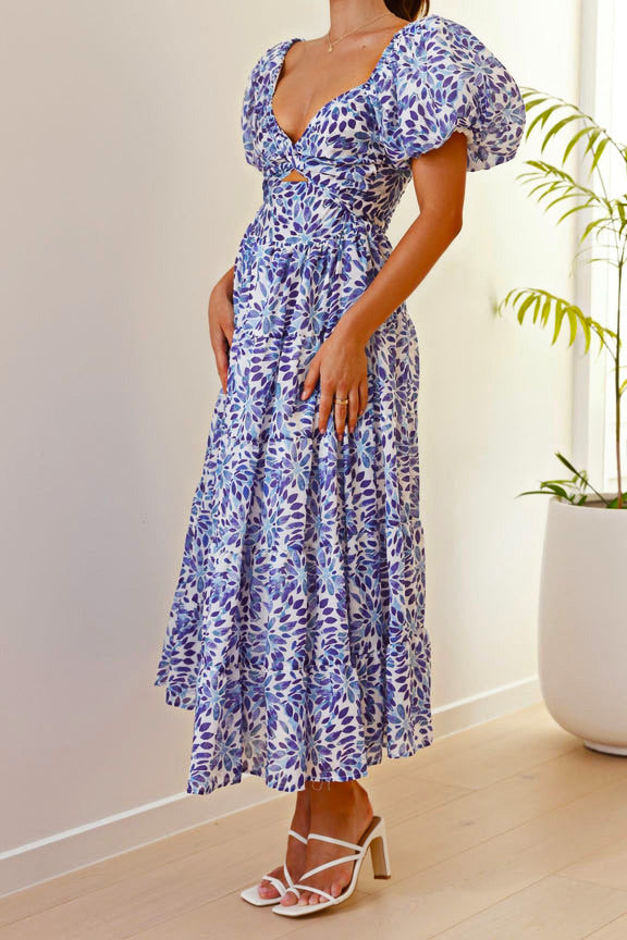 Midi-jurk met bloemenpofmouwen in blauw en wit