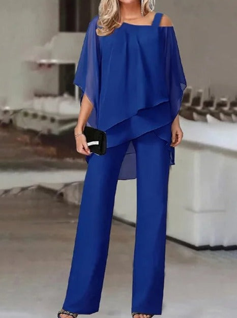 Luxuriöses, asymmetrisches Set aus schulterfreier Bluse und Hose 