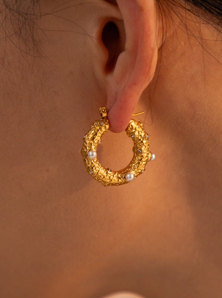 Ohrringe aus 18 Karat Gold und Edelstahl mit eingelegtem Zirkonia 
