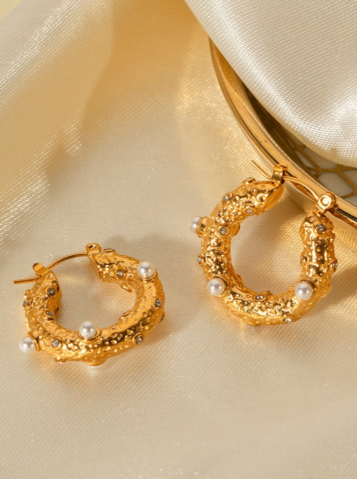 Ohrringe aus 18 Karat Gold und Edelstahl mit eingelegtem Zirkonia 