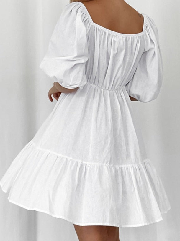 Elegantes weißes Kleid mit Puffärmeln und Kordelzug 