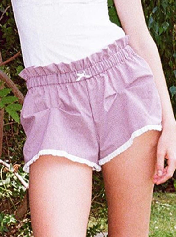 Rosa Shorts mit hoher Taille und kariertem Muster und Rüschen 
