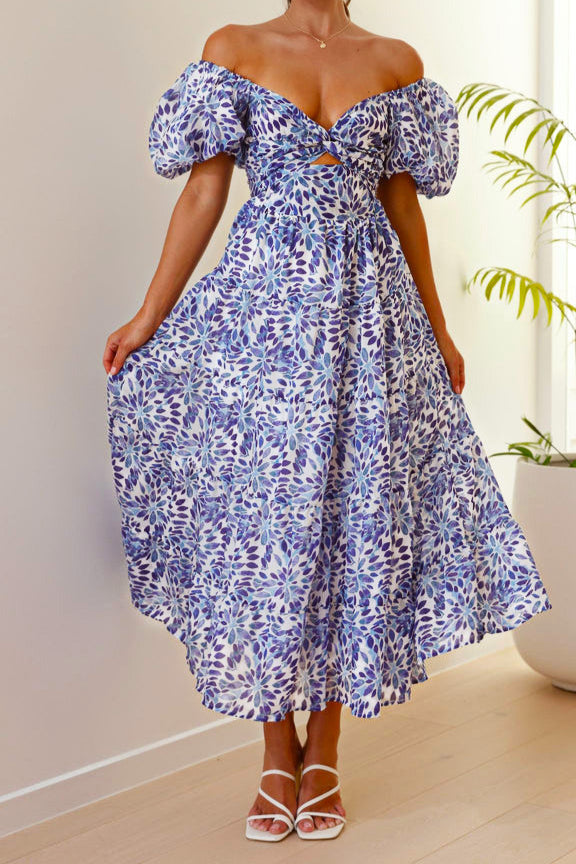 Midi-jurk met bloemenpofmouwen in blauw en wit